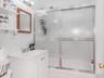 Apt 1 - Bathroom featuring toilet and vanity