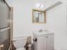 Apt 2 - Full bath with vanity and shower / bath combination with glass door