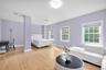 spacious Bedroom featuring light oak wood-flooring
