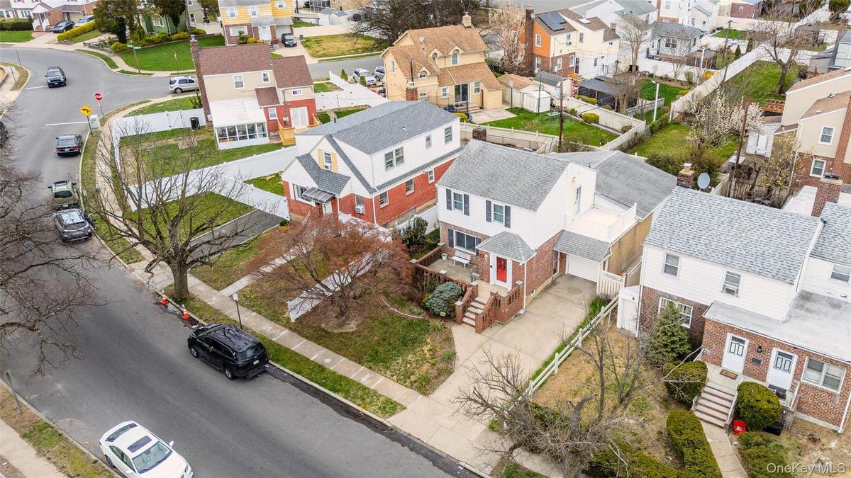 The property features a two-story home with large rear extension
