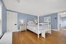 Primary bedroom with walk in closet.