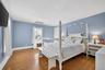 Primary bedroom on the second floor. Hardwood floors and nice mouldings.