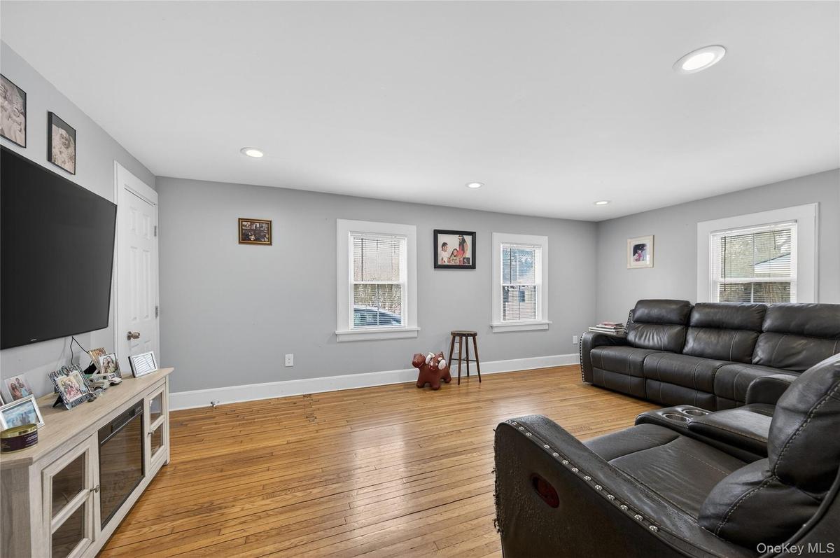 Sunny Living Room with access to the kitchen and Dining Room