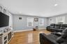Sunny Living Room with access to the kitchen and Dining Room