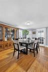 Formal Dining Room with hardwood floors  and plenty of space for enjoyable entertaining or intimate dining.
