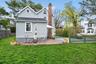 Backyard with a brick terrace.