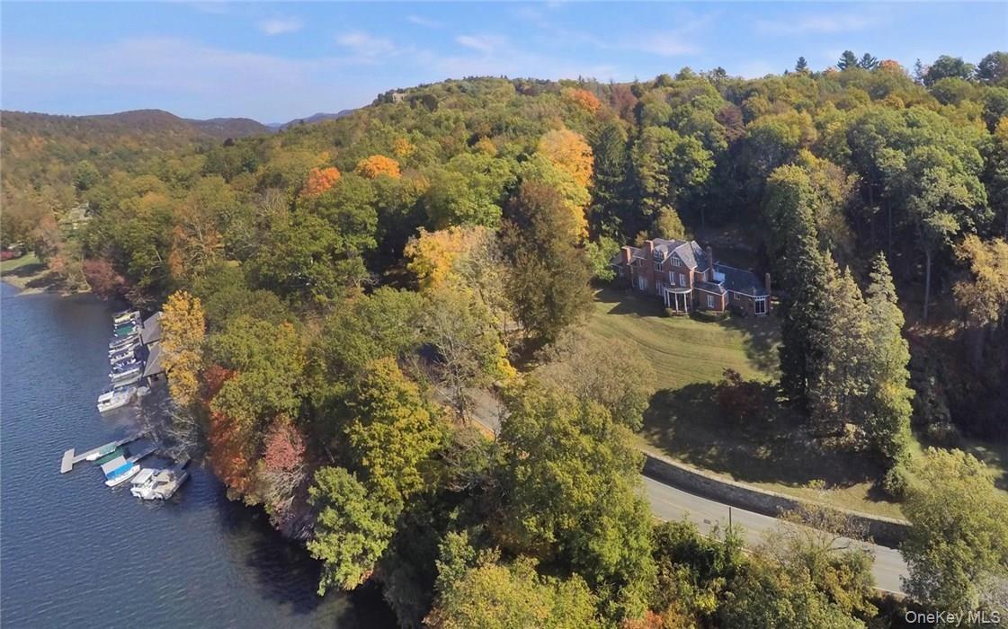 Steps away from private club boat house and docks