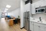 Kitchenette and open desk area
