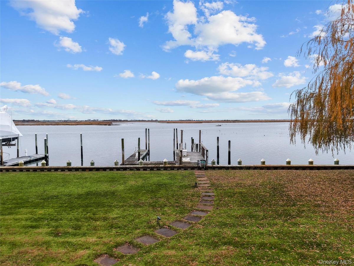 WATERFRONT PROPERTY WITH 2 BOAT SLIPS AND DOCK