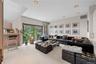 FAMILY ROOM WITH VIEW OF THE BACKYARD