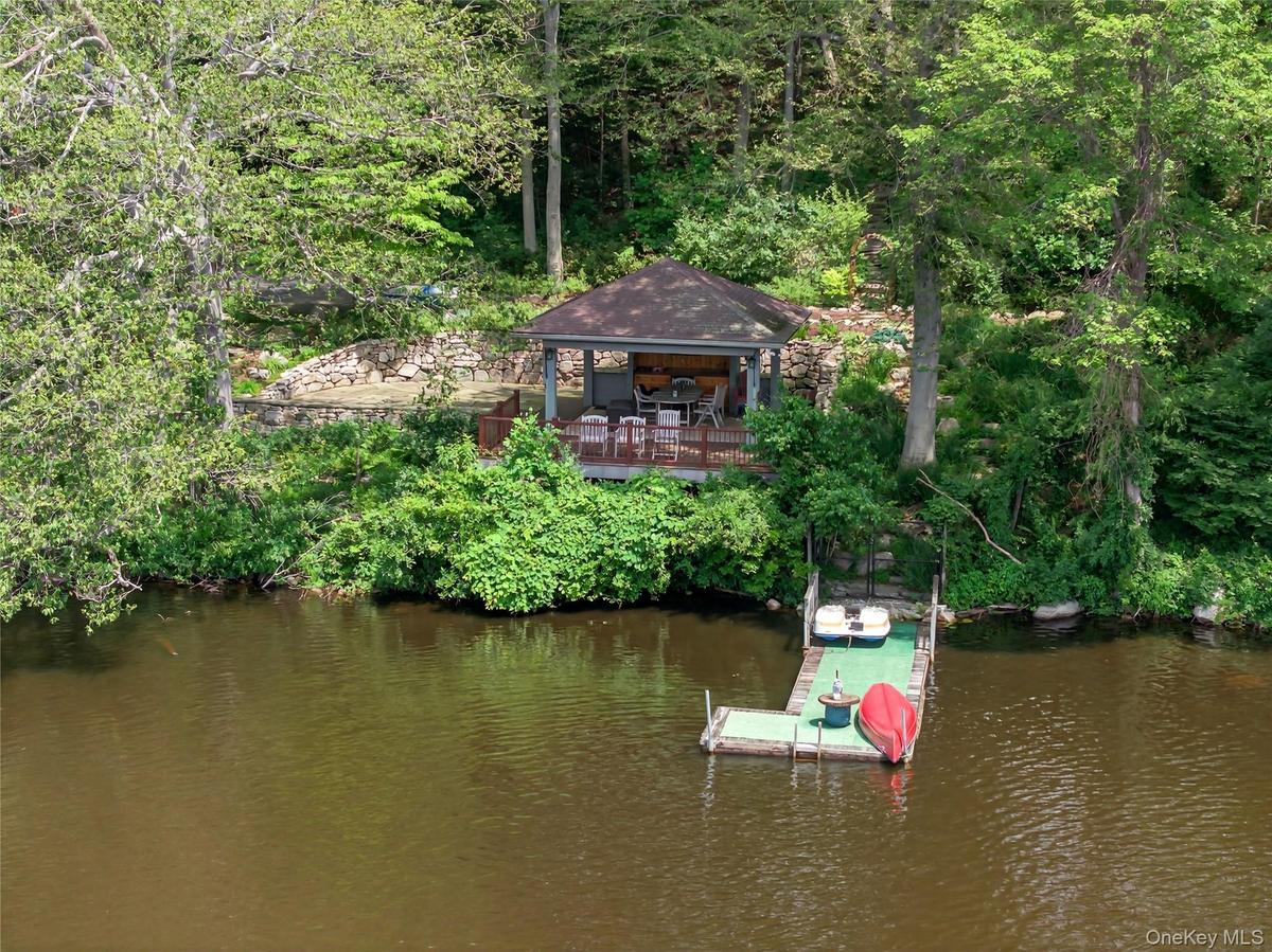 View of subject property featuring a nearby body of water