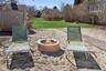 Loung Chairs outside on the Beach facing the back of the House and Yard
