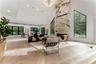Living Room with a towering ceiling and recessed lighting