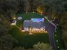 View from above of property featuring a forest