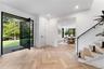 Entryway with recessed lighting and stairs
