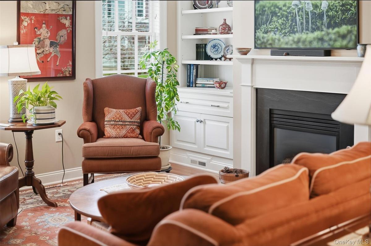 The gleaming hardwood oak flooring brings Luxury to this home
