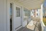 This entry door leads to additional space that's part of Merle Norman.