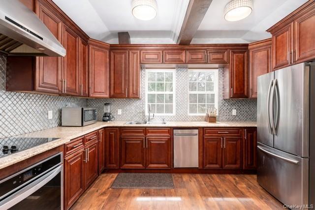Gourmet Kitchen with wood cabitnetry, granite tops, stainless appliances