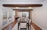Formal Diing Room with French doors to deck with another fireplace