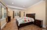 En Suite Two with gas fireplace, walk in closet - first floor