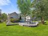 View of property showing a patio, a swimming pool, and a fenced backyard
