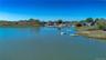 Water view featuring a floating dock