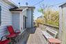Expansive outdoor deck featuring wood flooring and a perimeter railing