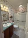 Full bath, main floor, wash up after a day out, or fun tinkering near the garage and basement