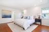 Bedroom with recessed lighting and wood finished floors