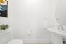 Bathroom featuring sink and toilet