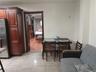 Tile flooring complemented by rich wood-finish cabinetry