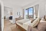 Bedroom featuring light wood finished floors and access to outside