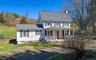 Two homes on the property: A 1900s 2 story farmhouse offering 3 bedrooms, 1 bath, and 1,482 SF across six rooms, complete with a welcoming open front 