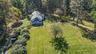 Yard surrounding the ranch styled home.