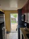 Rear door to Deck & backyard from kitchen