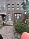View of front of house featuring brick siding
