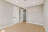 Unfurnished bedroom with recessed lighting, light wood-style floors, and a closet
