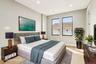 Bedroom with light wood-style floors and recessed lighting