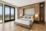 Bedroom featuring light wood finished floors, recessed lighting, and access to exterior