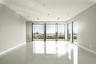 Empty room with light tile patterned floors and healthy amount of natural light
