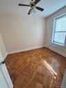 Spare room featuring baseboards