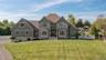 Builder's own home with Hardie plank and stone siding accents - immaculately maintained.