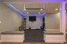 Lower level workout room featuring recessed lighting and custom storage benches