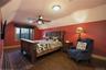 Bedroom with hardwood floors, WIC and private bath.