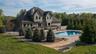 A backyard daydream, where a pristine pool and playful pops of luxury invite you to dive right in.