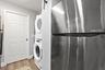 LAUNDRY ROOM WITH 2ND FRIDGE