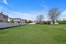 Expansive green lawn providing ample outdoor space