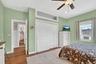 Primary bedroom designed for relaxation with convenient closet space