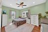Spacious, light-filled bedroom offering a peaceful retreat.