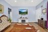 Sun-filled living room with a warm, welcoming atmosphere.